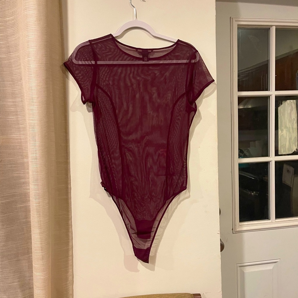 Sheer maroon Victoria secrets body suit never worn. Large